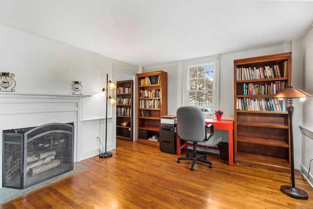 office space with hardwood / wood-style flooring