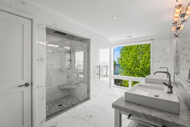 bathroom with vanity and an enclosed shower