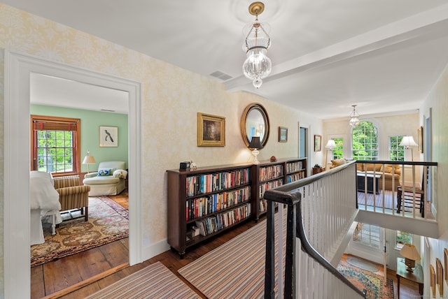 corridor featuring hardwood / wood-style flooring