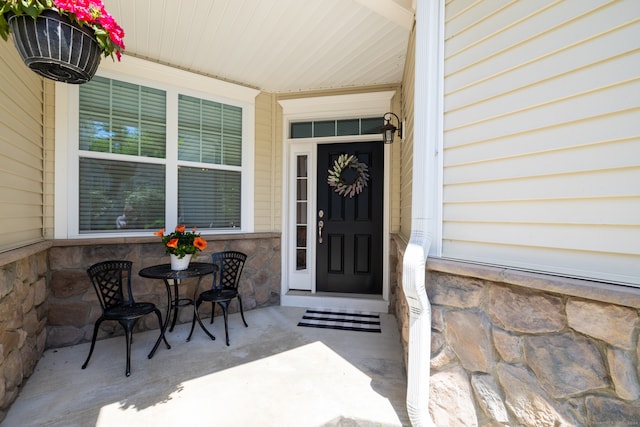 entrance to property with a porch