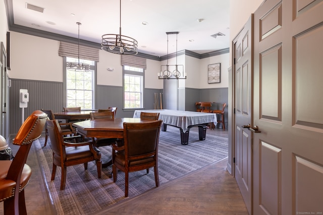 dining area featuring billiards, a chandelier, dark hardwood / wood-style floors, and ornamental molding