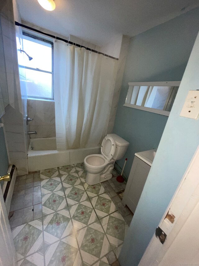 full bathroom featuring tile flooring, vanity, toilet, and shower / bath combo with shower curtain