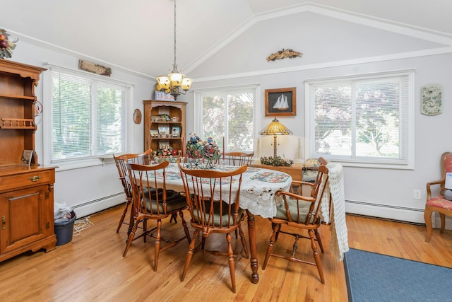 dining room featuring a notable chandelier, a baseboard heating unit, lofted ceiling, and light hardwood / wood-style floors