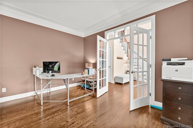 office area featuring wood-type flooring, ornamental molding, and french doors