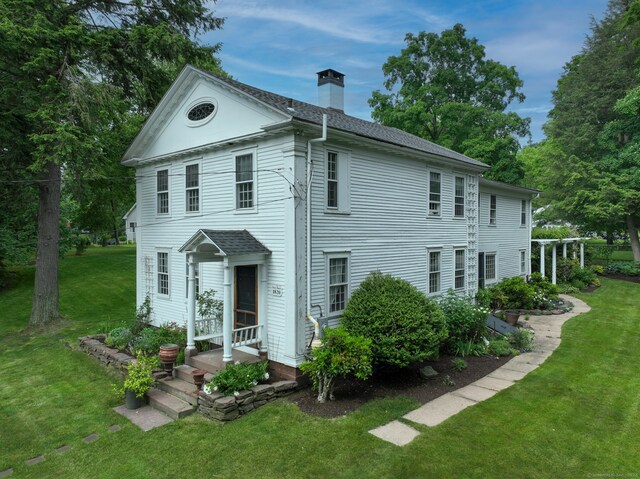 exterior space with a front lawn