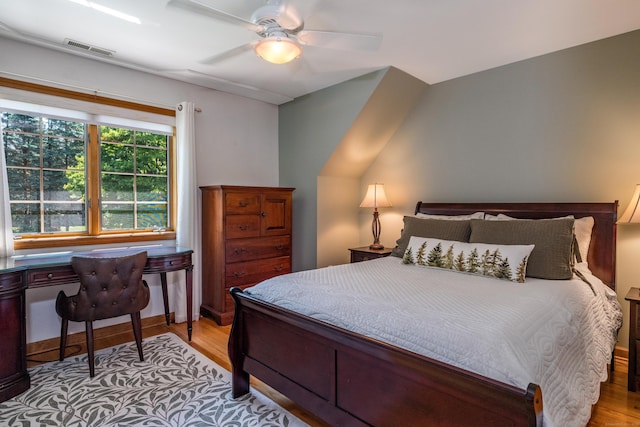 bedroom featuring ceiling fan and light hardwood / wood-style flooring