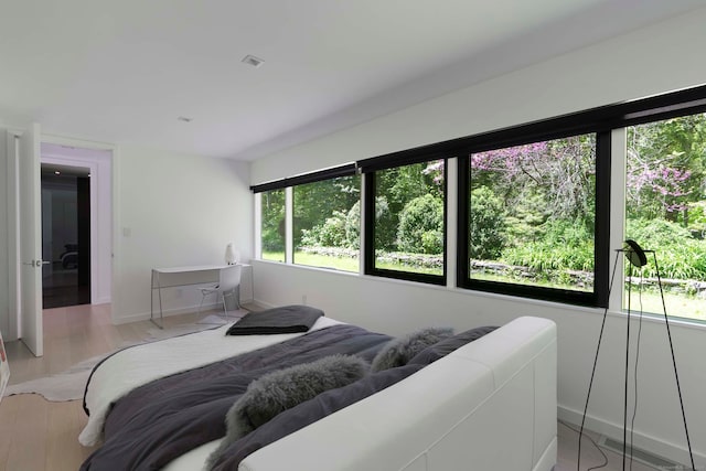 bedroom featuring light hardwood / wood-style floors