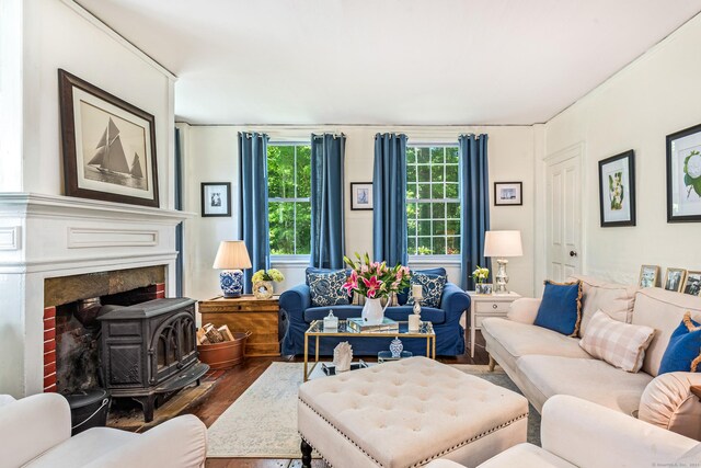 402 Perrin Rd, Woodstock, CT 06281 - living room with wood finished floors and a wood stove