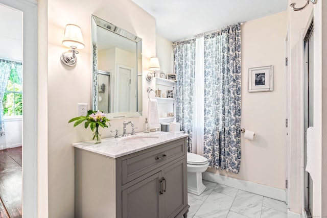 bathroom featuring vanity, toilet, and a shower with curtain