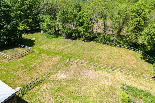 view of yard with a rural view