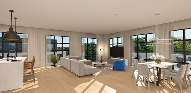 living room with sink and light wood-type flooring