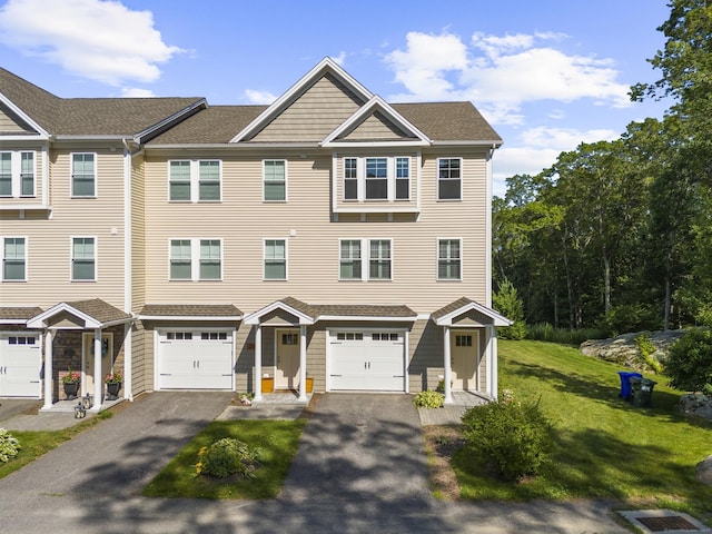 30 Village Xing Unit 30, East Lyme, CT 06357 - multi unit property featuring a garage, driveway, a front lawn, and a shingled roof