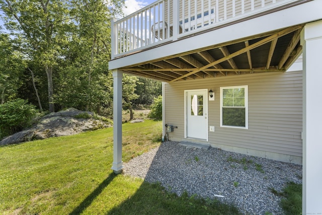 30 Village Xing Unit 30, East Lyme, CT 06357 - doorway to property featuring a lawn and a deck