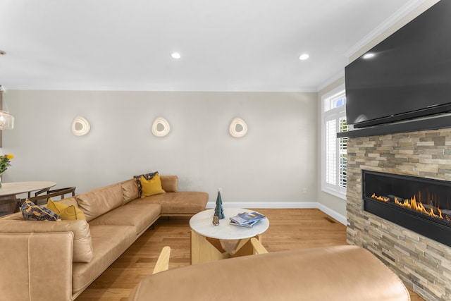 30 Village Xing Unit 30, East Lyme, CT 06357 - living area with crown molding, wood finished floors, a fireplace, and recessed lighting