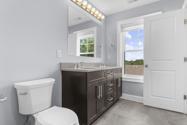 30 Village Xing Unit 30, East Lyme, CT 06357 - bathroom with double vanity and toilet