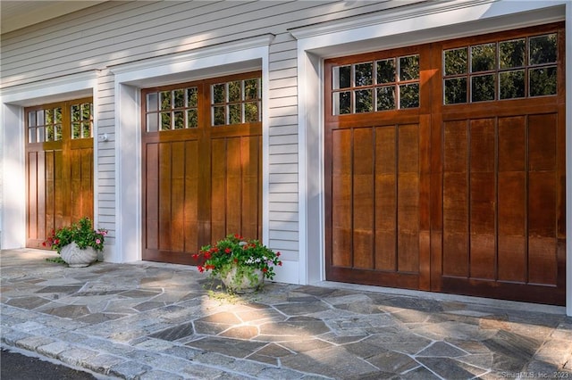 entrance to property featuring a garage