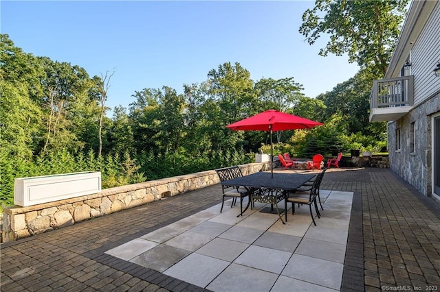 view of patio with a balcony