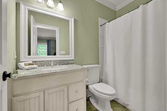 bathroom featuring vanity, ornamental molding, and toilet