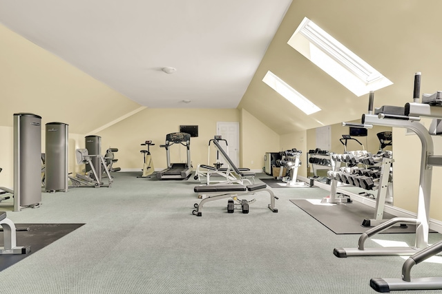 gym with vaulted ceiling with skylight