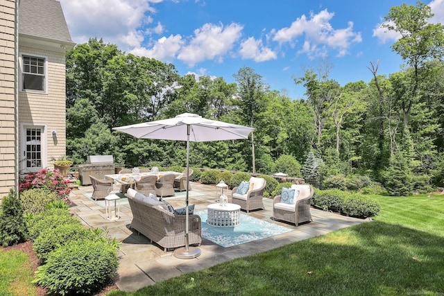 view of patio / terrace featuring area for grilling, grilling area, and an outdoor hangout area