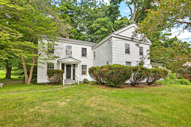 view of front of house with a front yard