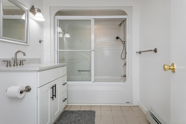 bathroom featuring shower / bath combination with glass door, vanity, a baseboard radiator, and tile patterned floors