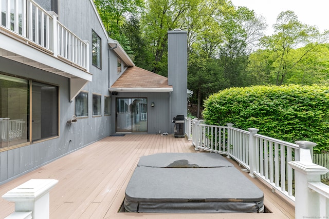 wooden deck featuring grilling area