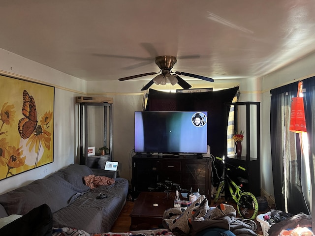 living room featuring ceiling fan