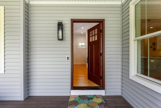 property entrance with covered porch