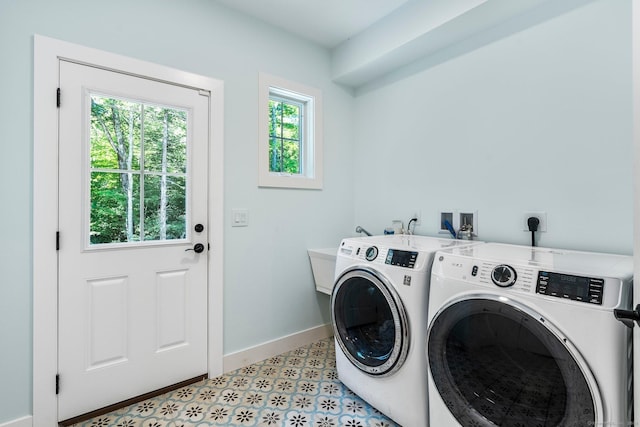 laundry room with separate washer and dryer