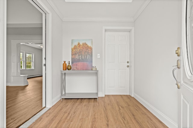 hallway with a baseboard heating unit, light wood-type flooring, and ornamental molding