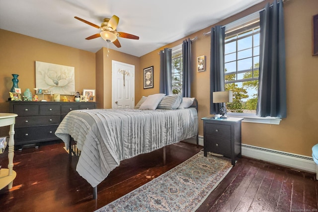 bedroom featuring a baseboard radiator, ceiling fan, and dark wood-type flooring