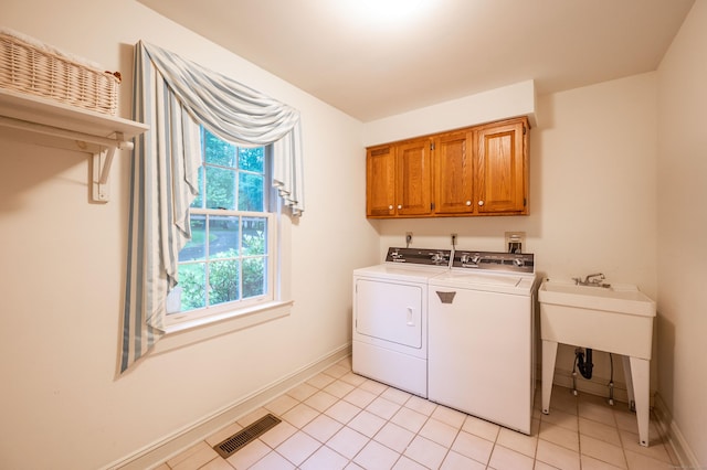 18 Hunters Ridge Rd, Southbury, CT 06488 - washroom with cabinet space, independent washer and dryer, baseboards, and light tile patterned floors