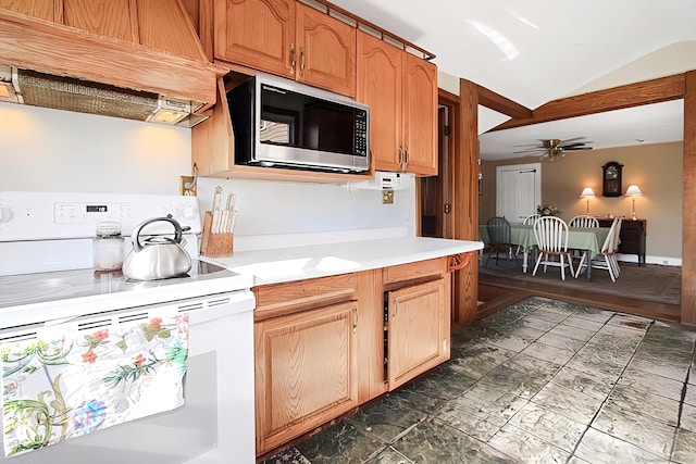 kitchen with custom range hood, white electric stove, ceiling fan, and lofted ceiling