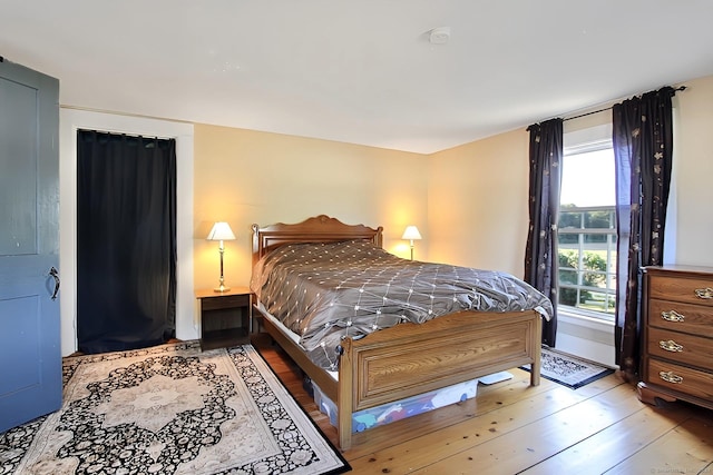 bedroom featuring light hardwood / wood-style floors