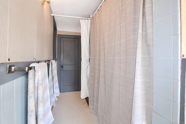 bathroom featuring wood-type flooring