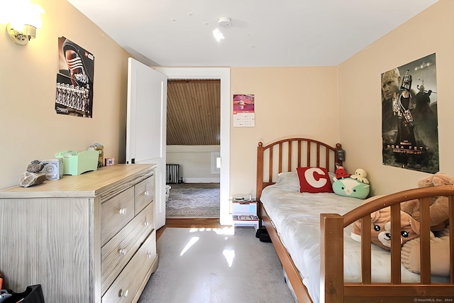 bedroom featuring radiator