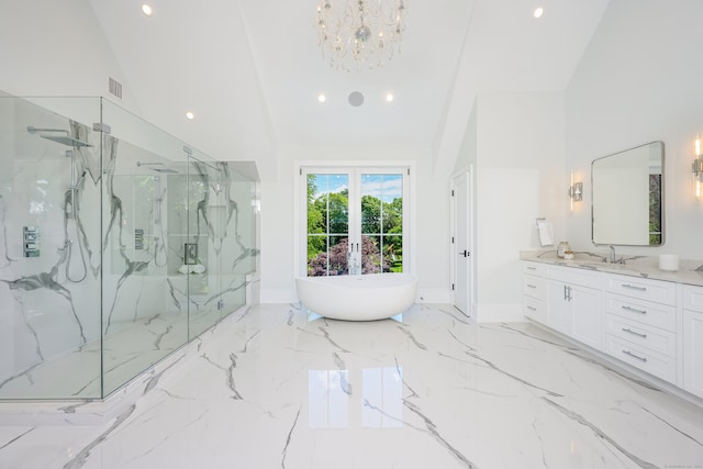 bathroom featuring vanity, shower with separate bathtub, high vaulted ceiling, and an inviting chandelier