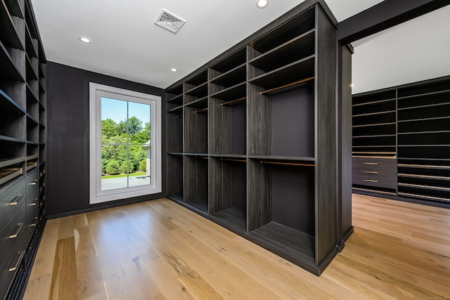 walk in closet featuring light wood-type flooring