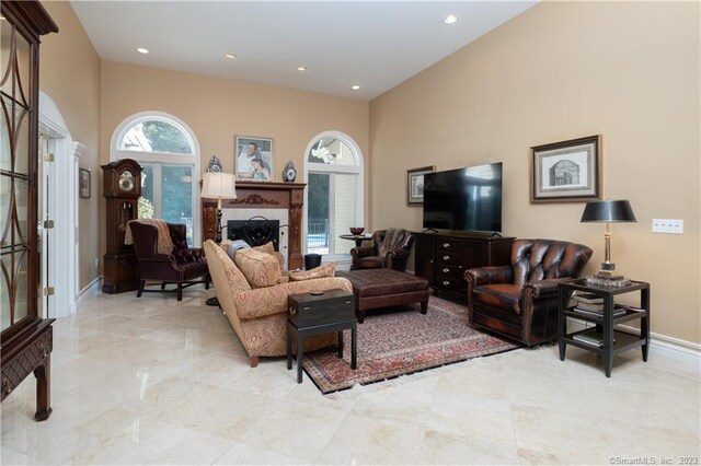 living room featuring light tile floors