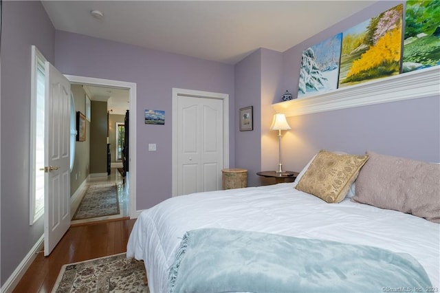 bedroom featuring a closet and hardwood / wood-style floors