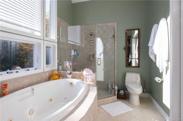 bathroom with shower with separate bathtub, toilet, and tile floors