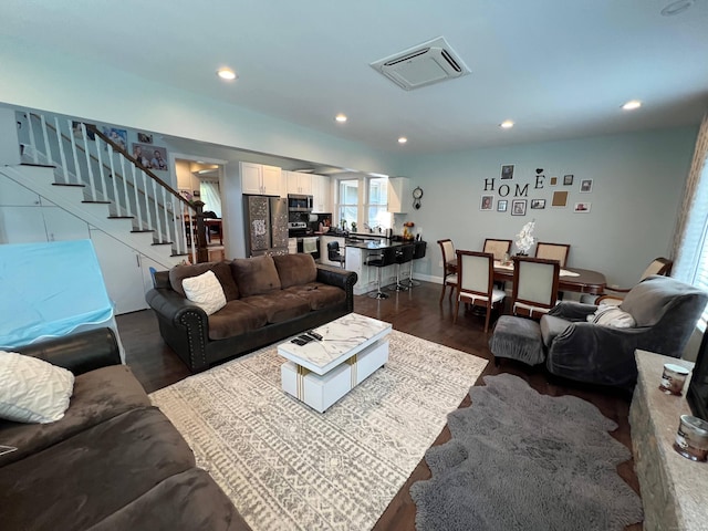 living room with dark wood-type flooring