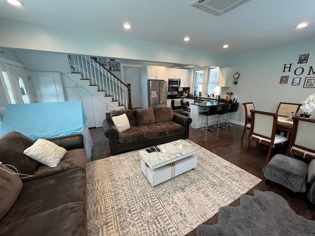 living room with dark wood-type flooring