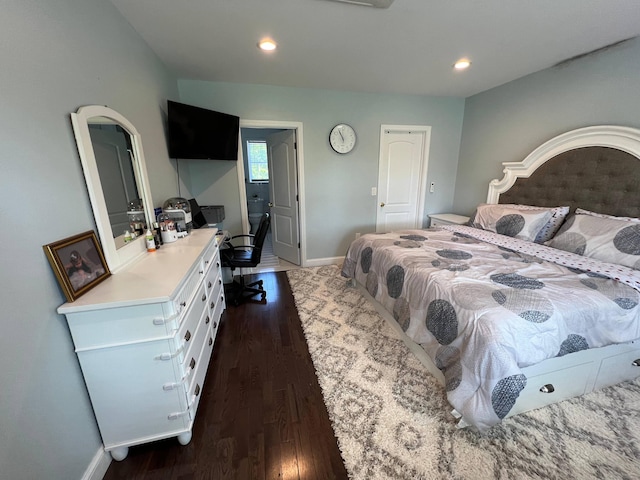 bedroom featuring dark hardwood / wood-style floors