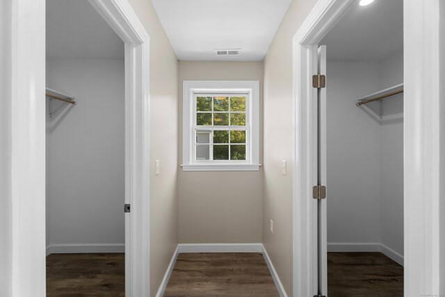 203 Winding Hollow Rd, Groton, CT 06340 - interior space with visible vents and wood finished floors