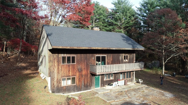 exterior space with a patio area and a balcony