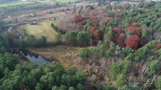 birds eye view of property featuring a rural view and a water view