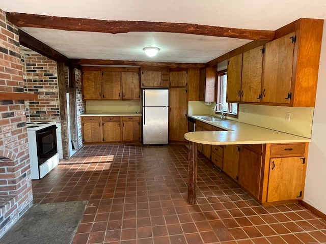 kitchen featuring sink, beamed ceiling, electric range, stainless steel refrigerator, and brick wall