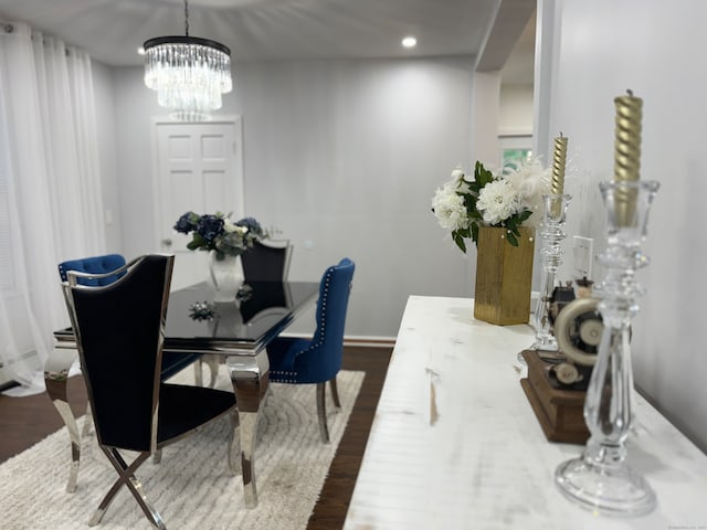 office area featuring hardwood / wood-style flooring and an inviting chandelier